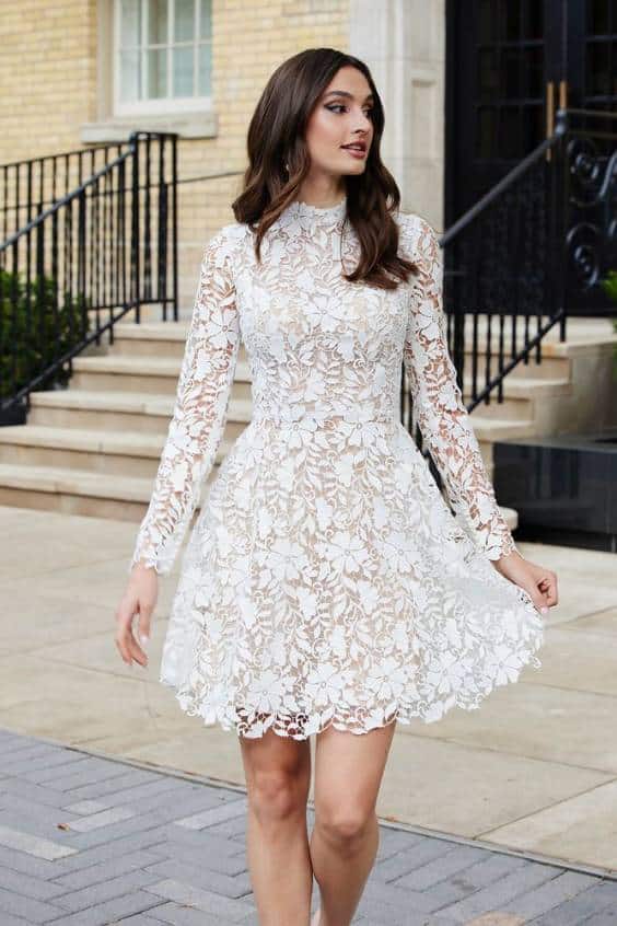an ultra-feminine floral lace white dress